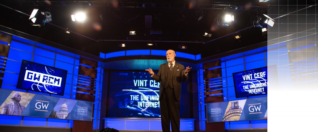 Man presenting in the auditorium