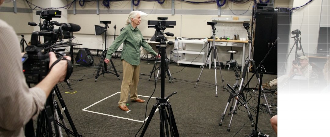 Jane Goodall standing in a research lab