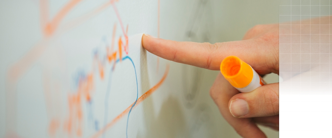 finger pointing on whiteboard