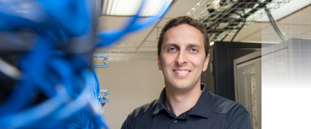 Tim Wood standing in the server room