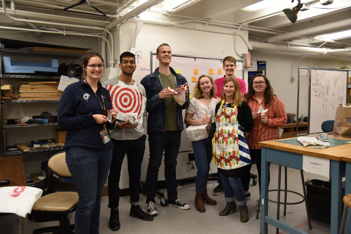 group of students and GWIC director