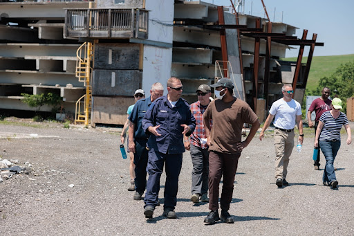 group in front of a testing building