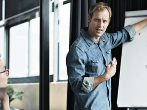 man at whiteboard