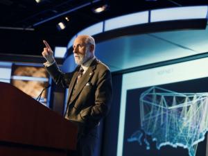 Vint Cerf speaking at podium