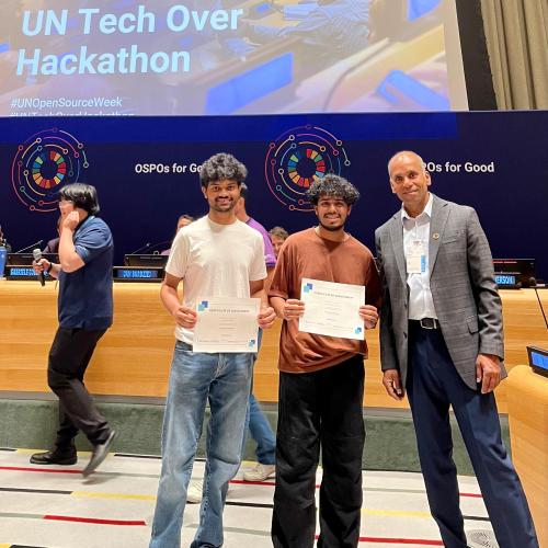 Dhairya Shah and Anket Patil holding their certificate