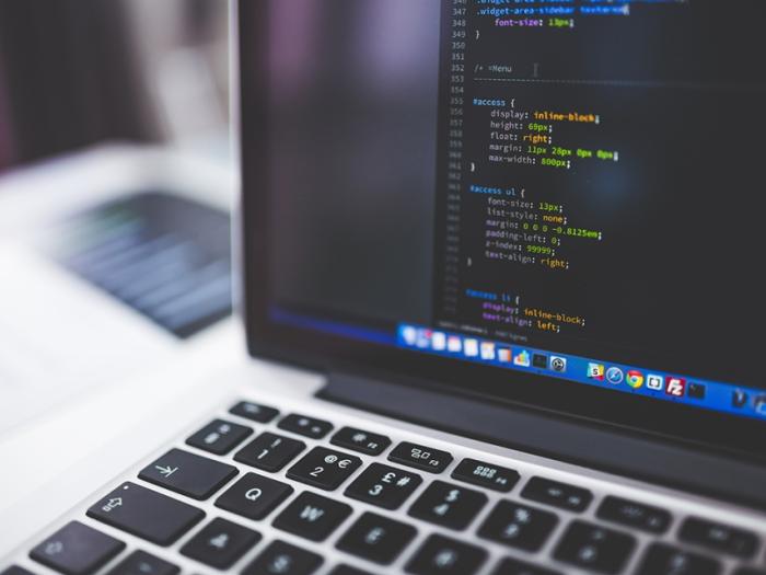 Laptop with CSS code on screen