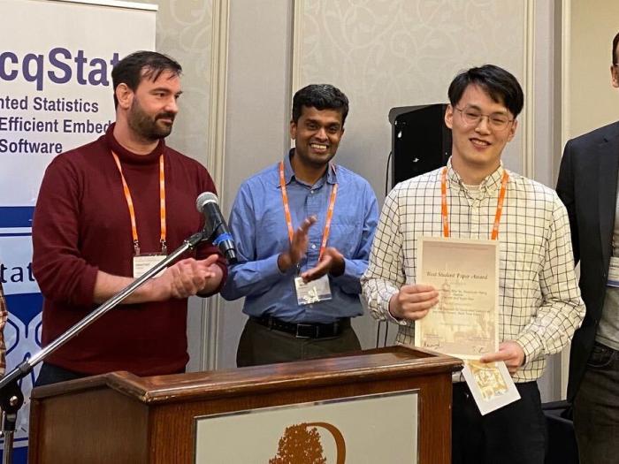 Gabe parmer and students at IEEE Real-Time Systems Symposium