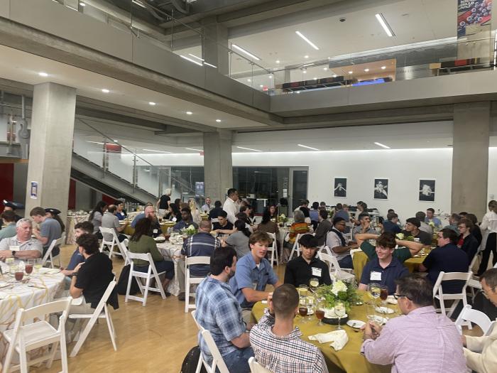 Students eating at the event