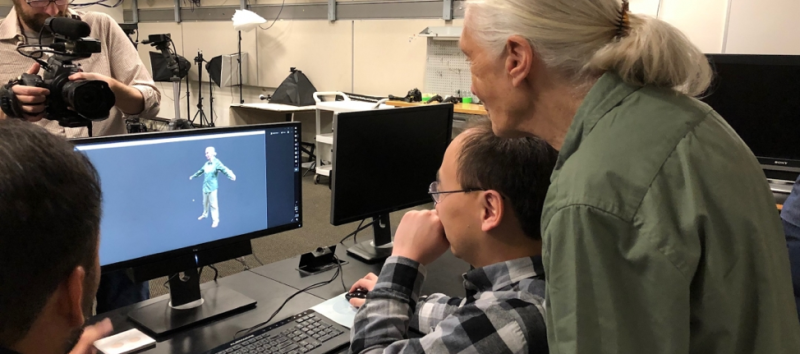 2 people looking at a computer screen