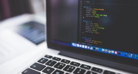 Laptop with CSS code on screen