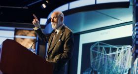 Vint Cerf speaking at podium