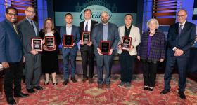 GW Engineering Professors Xitong Liu, Adam Aviv, and Danmeng Shuai pictured with their awards along GW leadership and fellow OVPR awardees.