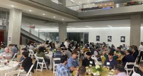 Students eating at the event